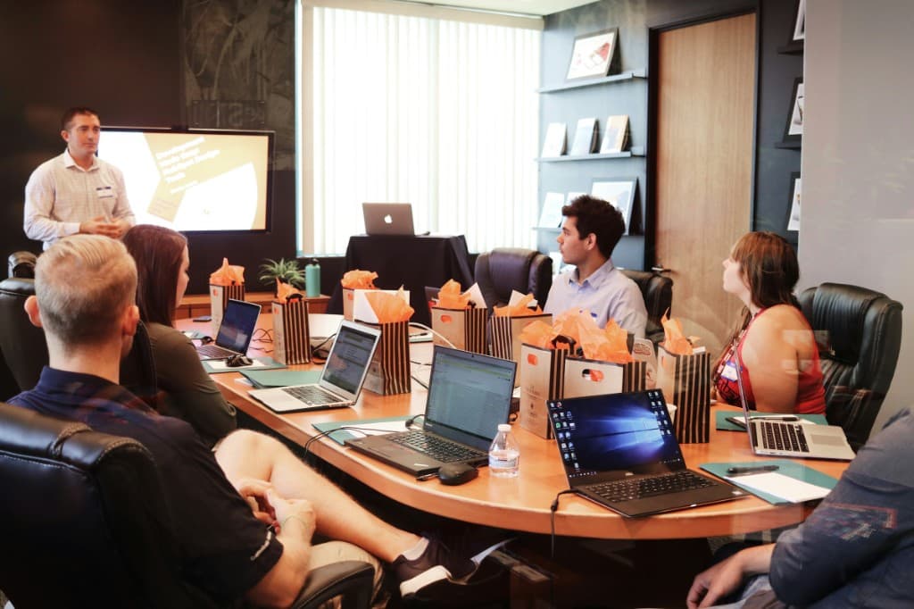Contexture Consulting team collaborating in a meeting room.